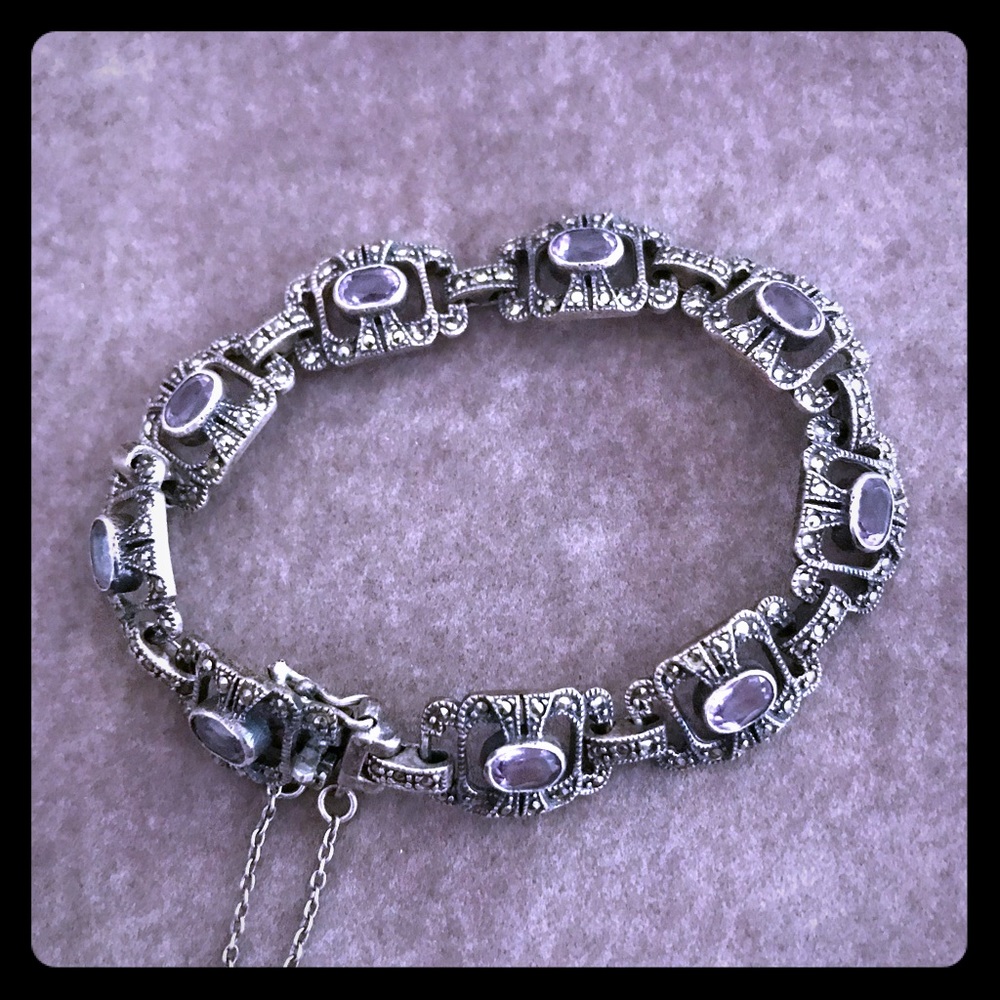 Silver bracelet with purple stones